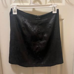 Black silk mini skirt
